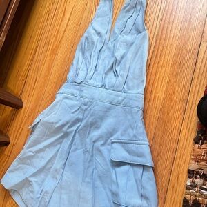 DO+BE Blue Jumpsuit with V-Neckline and Fitted Bodice